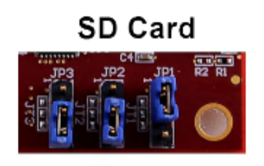 Carte SD avec trois emplacements étiquetés JP1, JP2, JP3 et un support de batterie à pile à pièces.