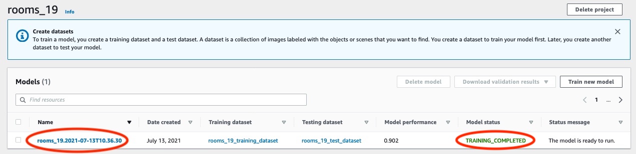 Model training interface showing completed status for model named "rooms_19.2021-07-13T10:36:30" with performance score 0.902 and status "TRAINING_COMPLETED".