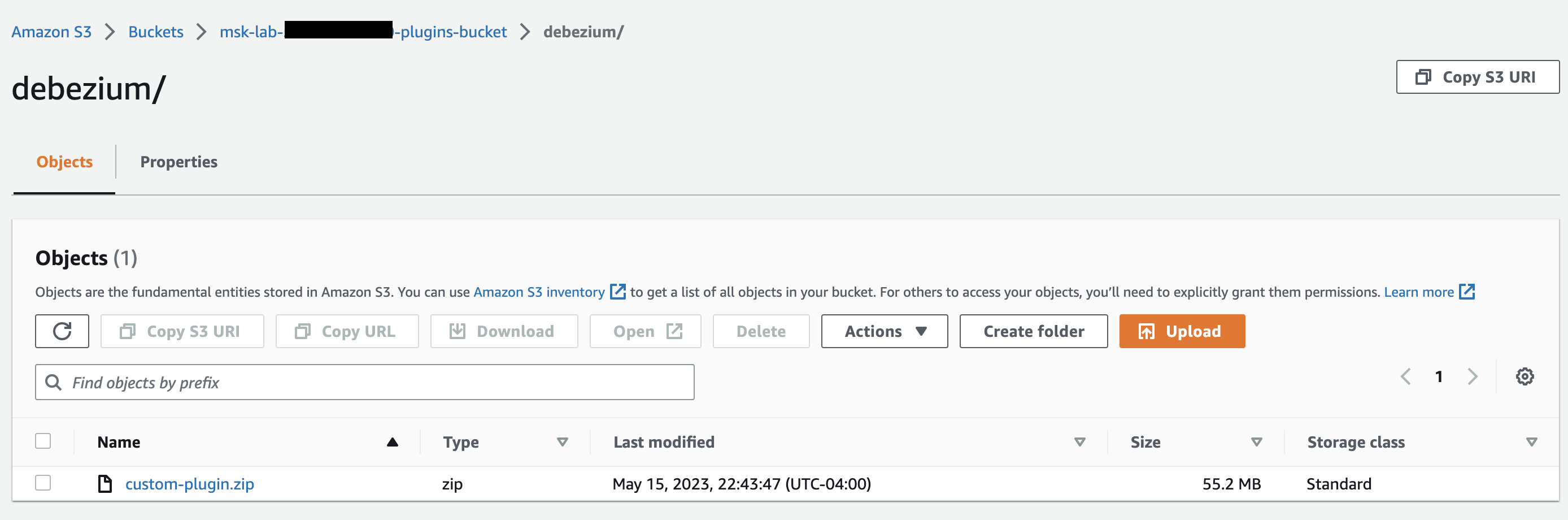 Amazon S3 bucket interface showing a single custom-plugin.zip file in the debezium folder.