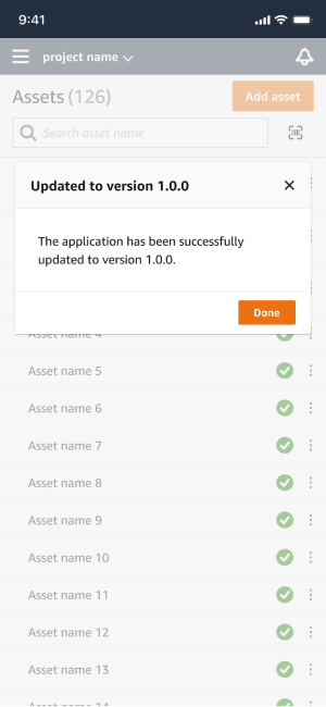 Mobile app interface showing successful update to version 1.0.0 with a list of assets below.